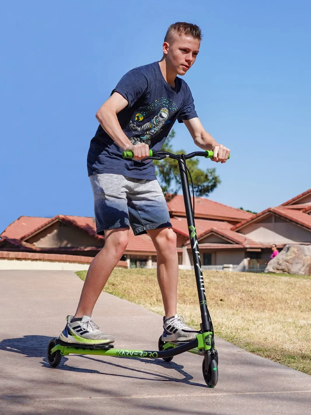 Madd Gear X-Karver Pro 3-in-1 sparkcykel svart/grön lysande