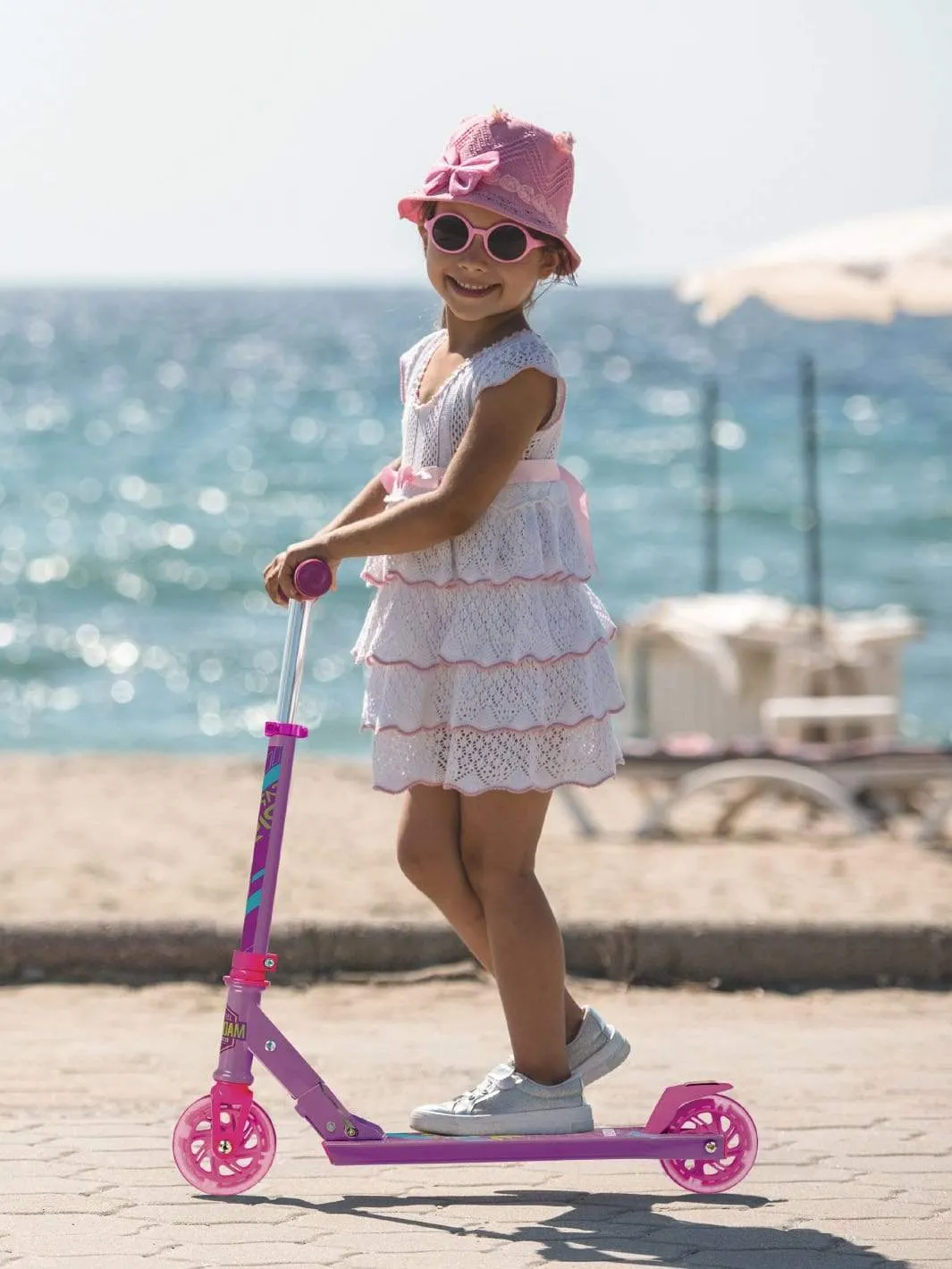 Madd Gear Rize 100 sparkcykel rosa lila lysehjul